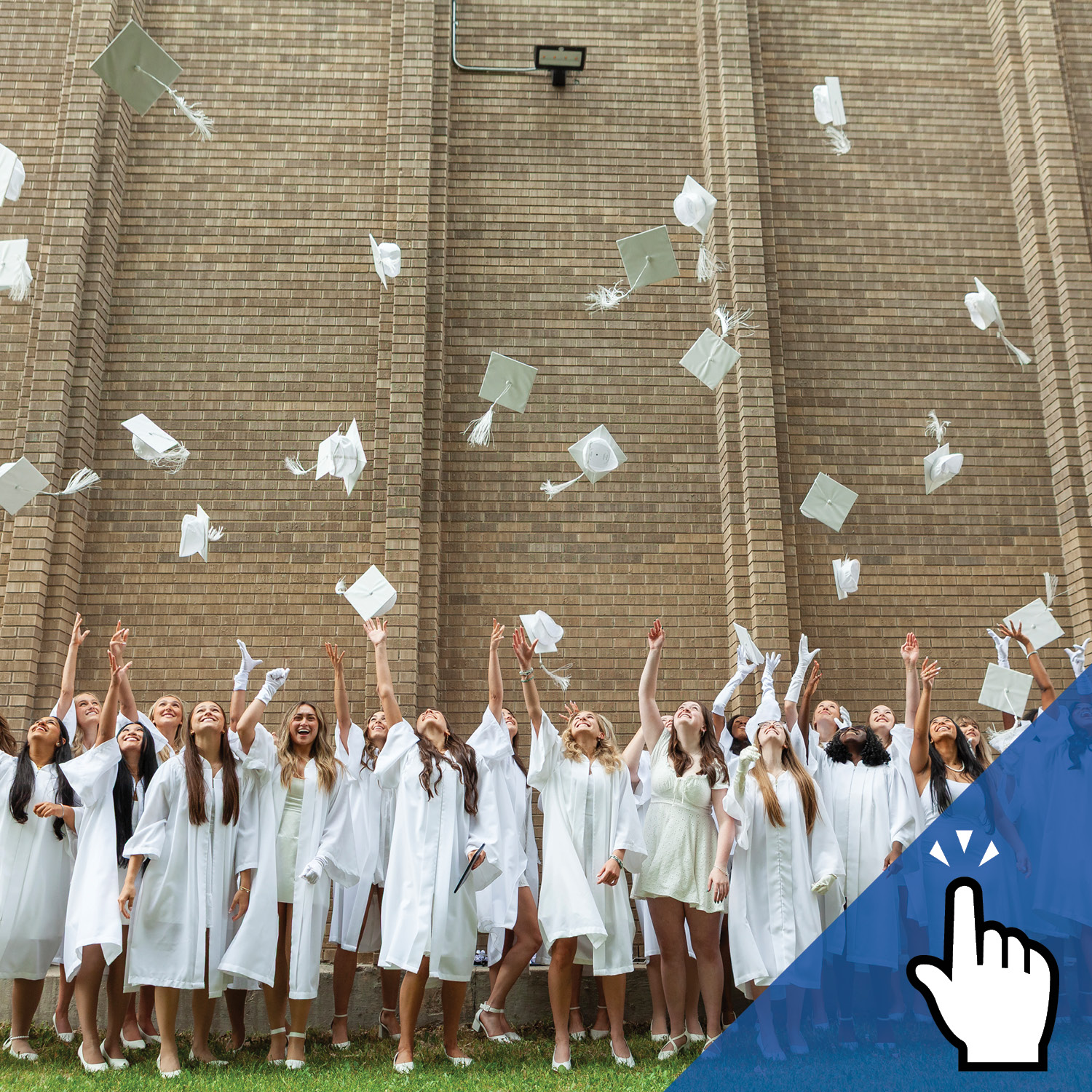 a group of graduating students throwing their graduation caps in the air