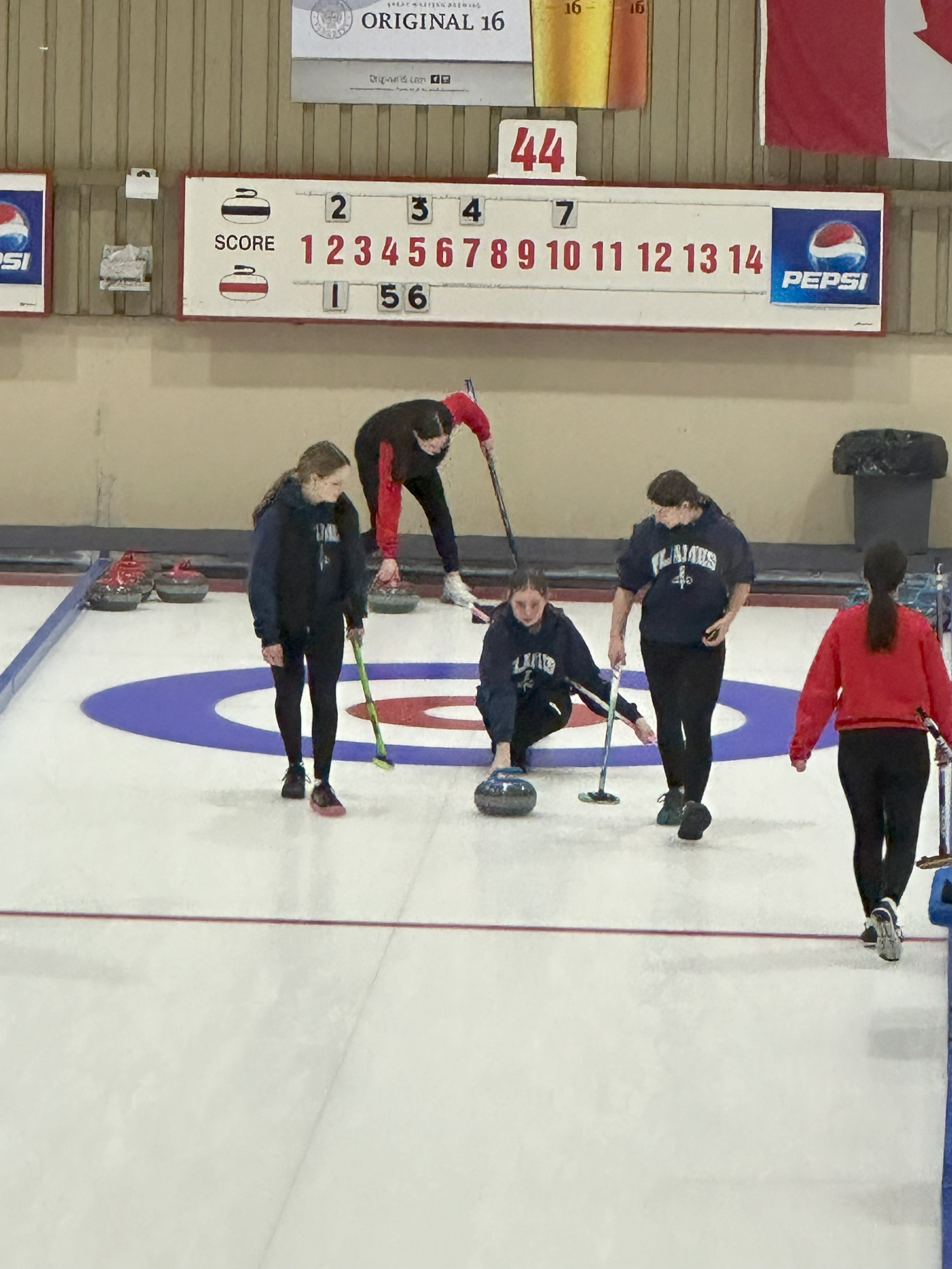 three SMA girls playing curling