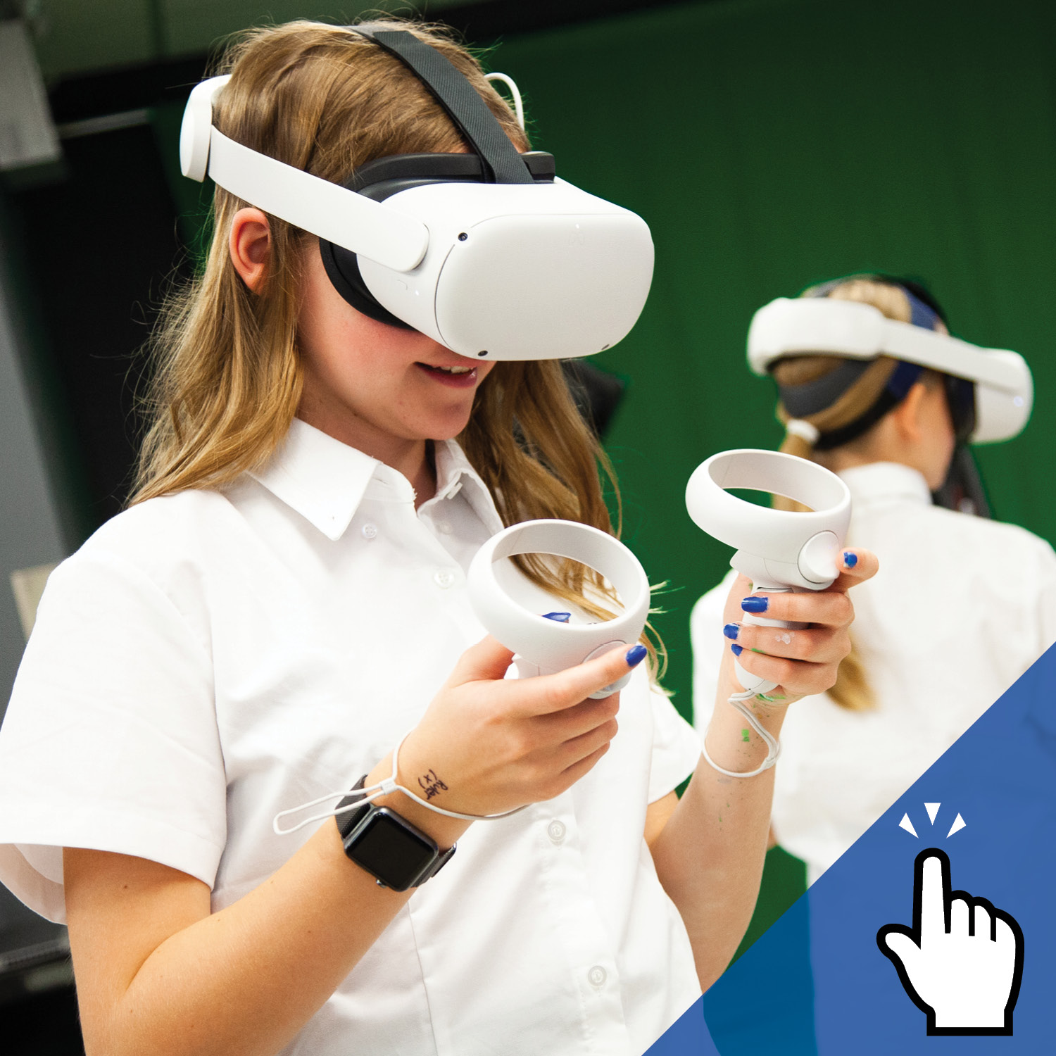 two students wearing virtual reality headsets